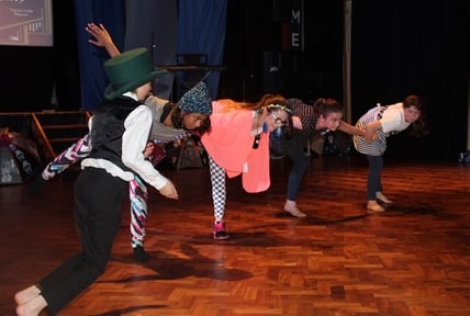 Young people flying in production of Peter Pan