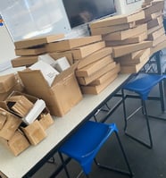 Boxes of art materials ready to send to students